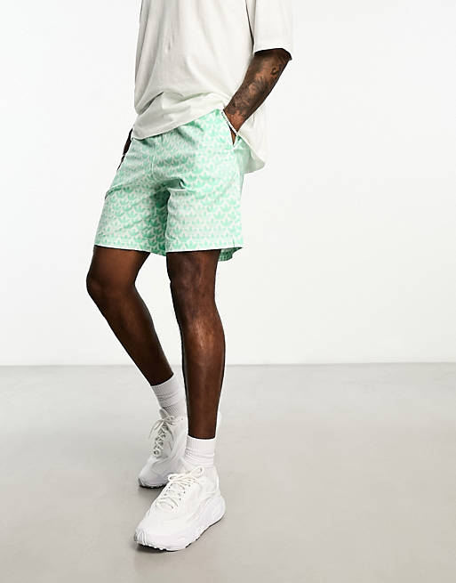 adidas Originals Monogram AOP shorts in green | ASOS