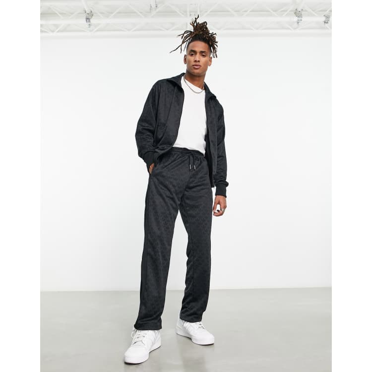 Adidas Men's Originals Graphics Monogram Track Pants in Black/Black Size Small | Polyester