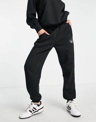 adidas Originals Mountain Explorer contrast cuffed joggers in black, £60.00