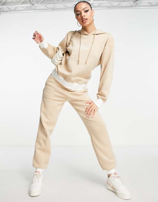 Beige adidas hot sale tracksuit womens