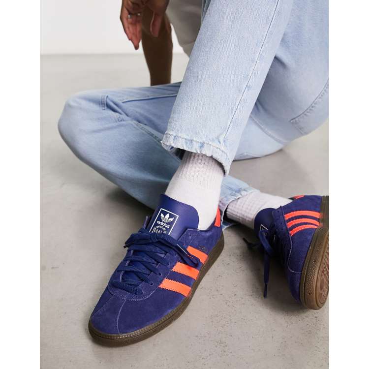 adidas Originals Munchen sneakers in blue and red with gum sole | ASOS