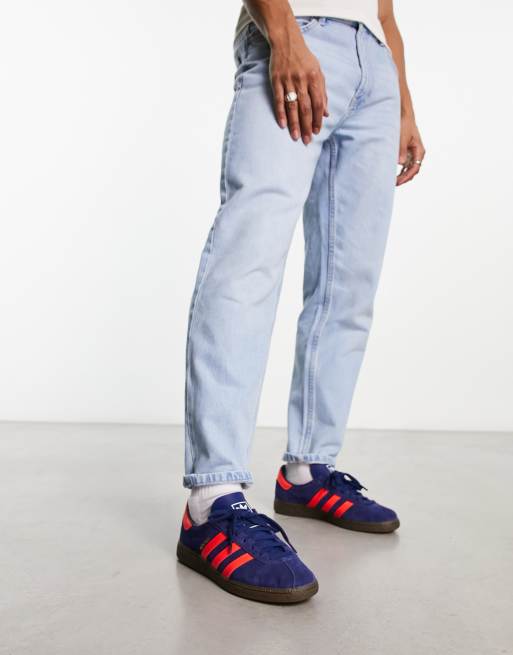 adidas Originals Munchen sneakers in blue and red with gum sole