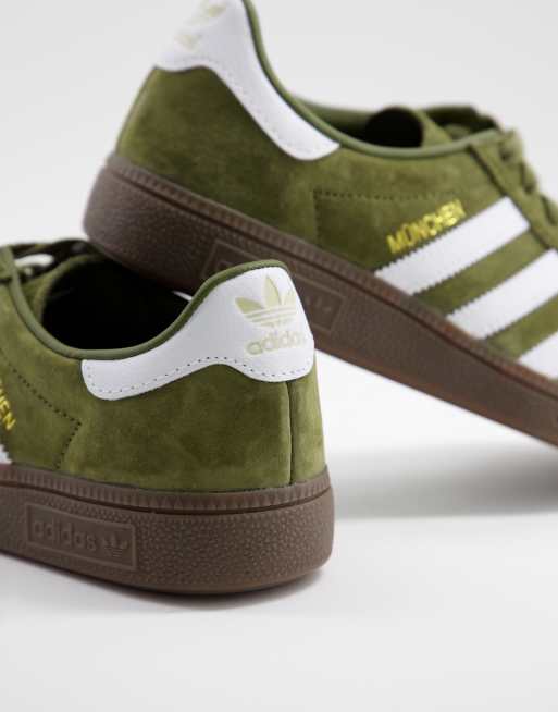 adidas Originals Munchen sneakers in green with gum sole