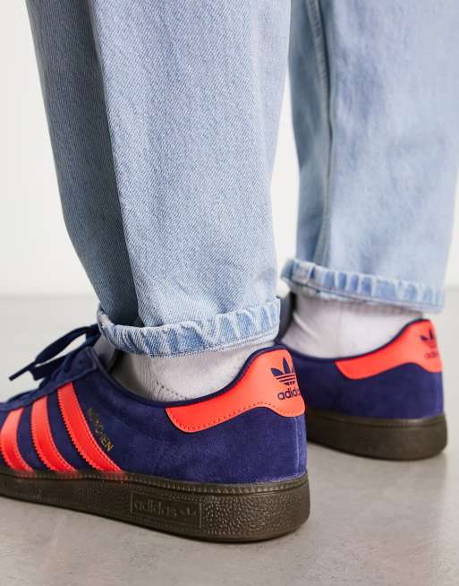 Blue and shop red adidas trainers