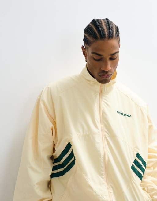 adidas Originals – München – Trainingsoberteil aus Webstoff in Cremeweiß und Marineblau, 4 von 7