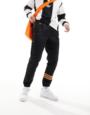 Adidas Originals Neuclassics Joggers In Black And Orange