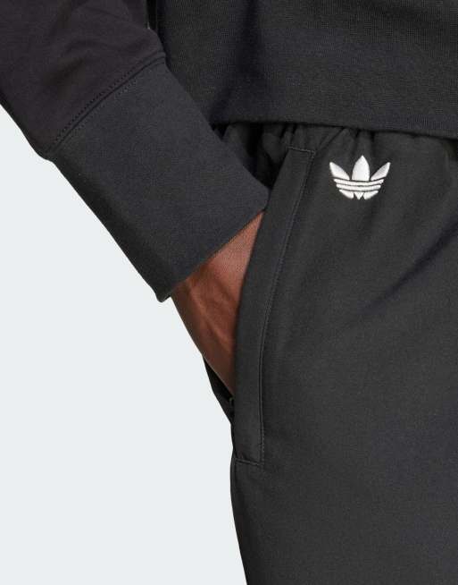 adidas Originals Neuclassics woven pants in black