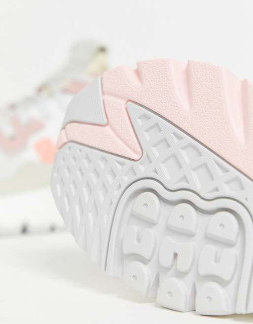 adidas Originals Nite Jogger Sneakers in roze en gebroken wit