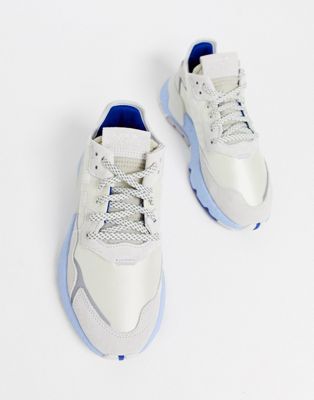 adidas originals nite jogger sneakers in white and blue