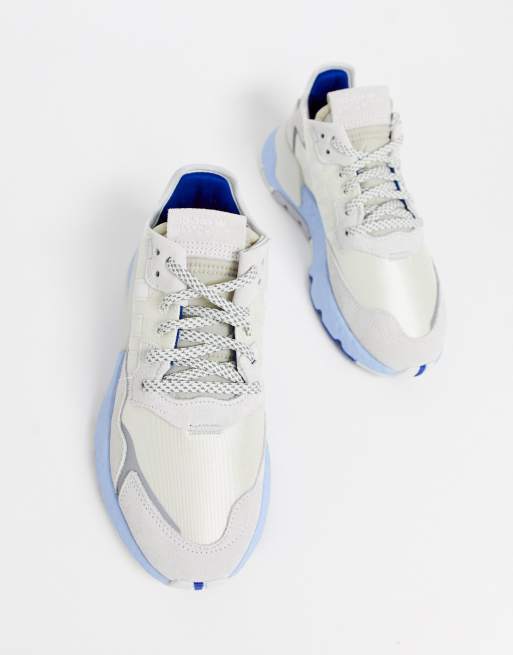 adidas Originals Nite Jogger sneakers in white and blue | ASOS