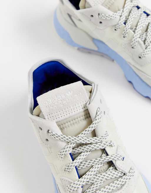 adidas Originals Nite Jogger trainers in white and blue