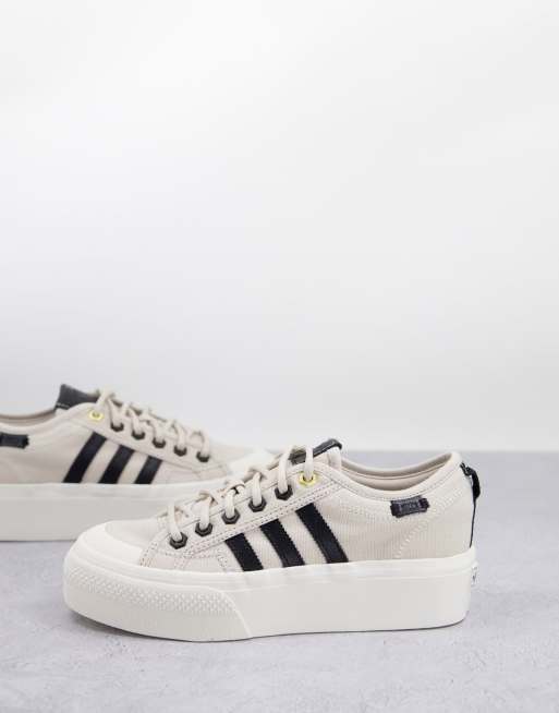 adidas Originals - Nizza - Baskets à semelle plateforme - Blanc cassé et noir