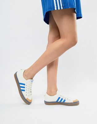 adidas originals nizza canvas trainers in white and blue