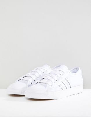 white adidas canvas trainers 