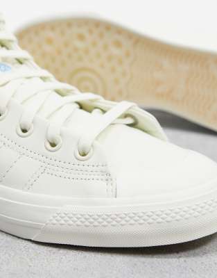 white canvas high tops
