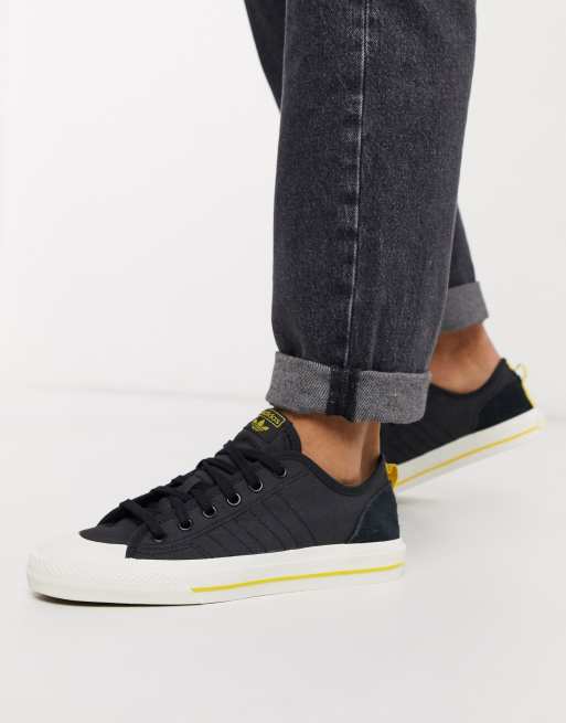 Adidas black 2025 nizza low trainers