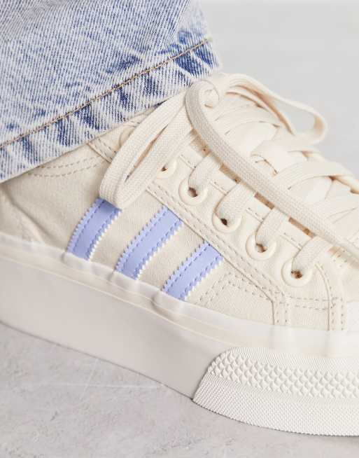 adidas Originals Nizza Platform low sneakers in cream and light blue