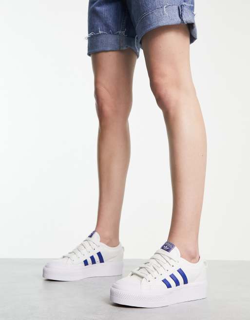 adidas Originals Nizza Platform low sneakers in white and navy |