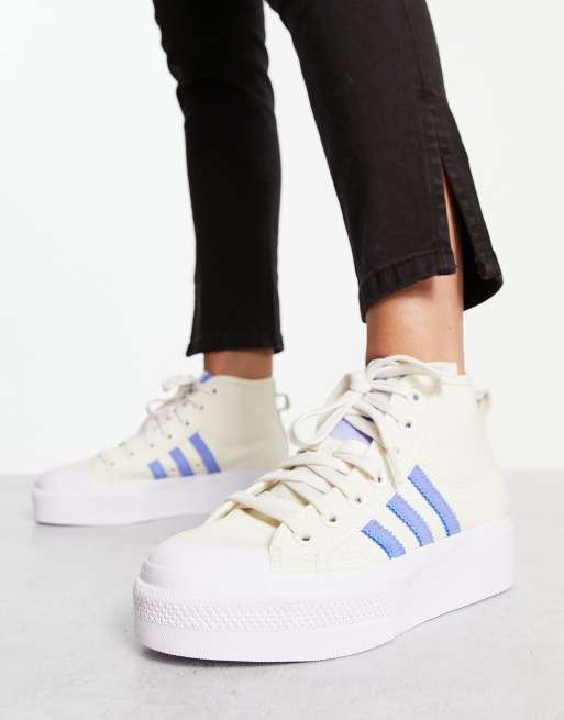 adidas Originals Nizza platform mid trainers in off white and blue