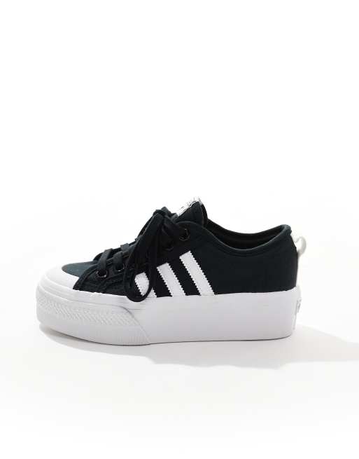 adidas Originals Nizza platform sneakers in black and white