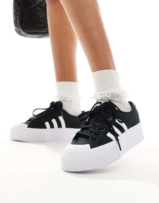 Adidas originals black store and white nizza trainers