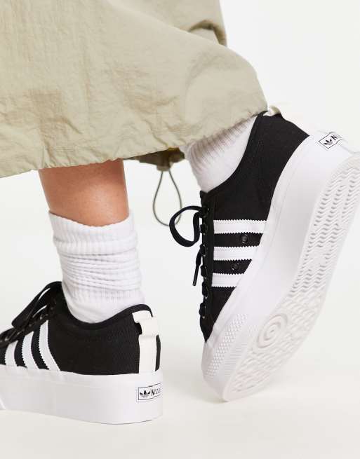 Adidas black 2024 platform sneakers