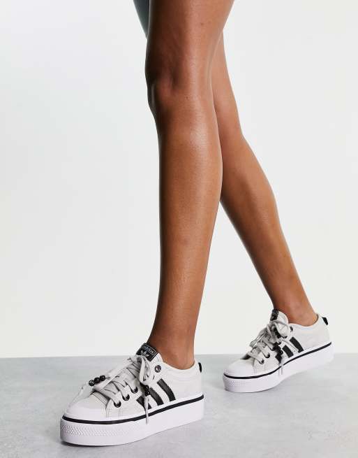 Adidas originals white and black nizza sneakers online