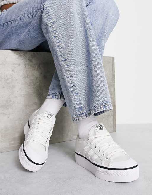 adidas Nizza platform sneakers in off-white with black piping ASOS