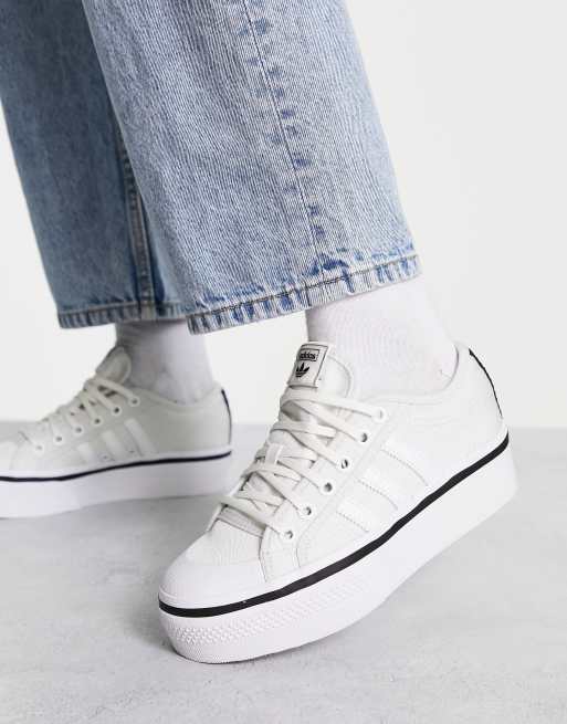 adidas originals nizza platform sneakers in black and white