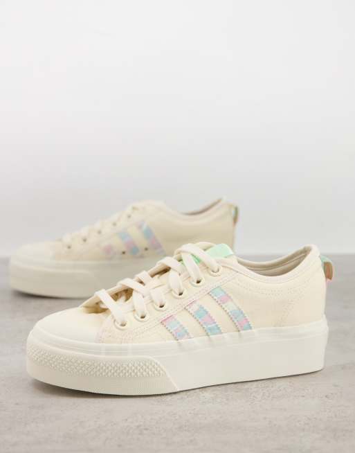 adidas Originals Nizza Platform trainers in chalk white with watercolour detail