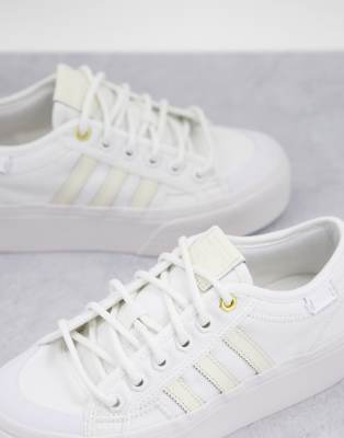 white nizza platform trainers