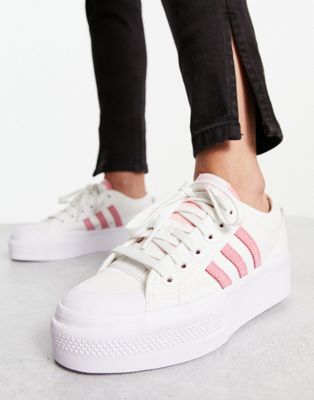 adidas Originals Nizza platform trainers in white and pink