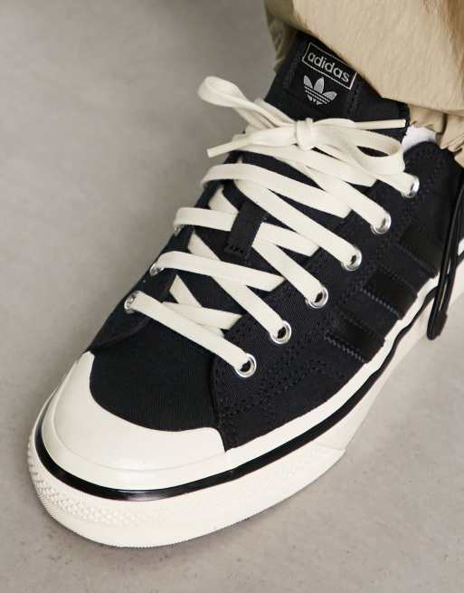 Adidas originals black and white nizza sneakers hotsell