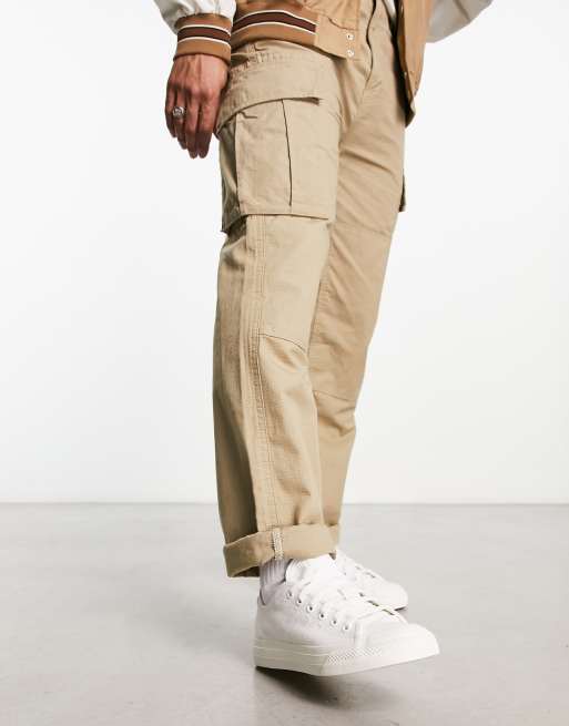 Adidas originals khaki store and white nizza trainers