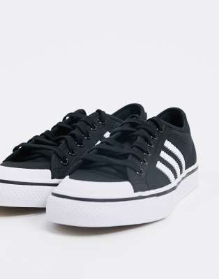 adidas Originals Nizza trainers in black and white