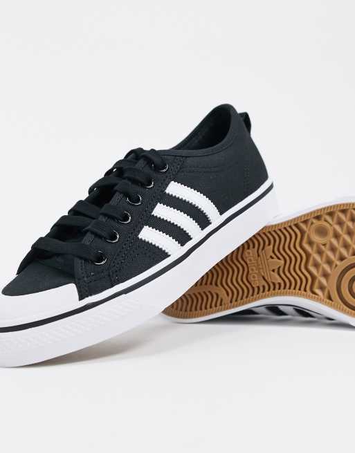 Adidas originals black and white store nizza trainers