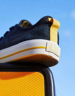 black suede adidas trainers