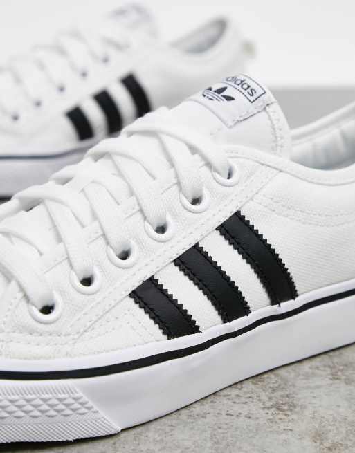 White adidas shop nizza trainers