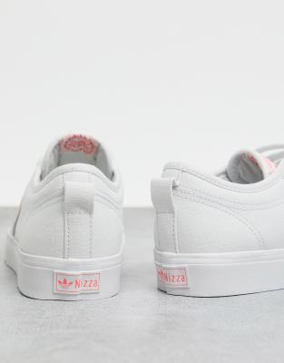 adidas originals nizza trainers in white with pink heart