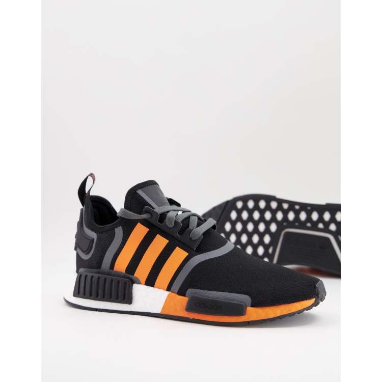 adidas Originals NMD R1 trainers in black with orange stripes