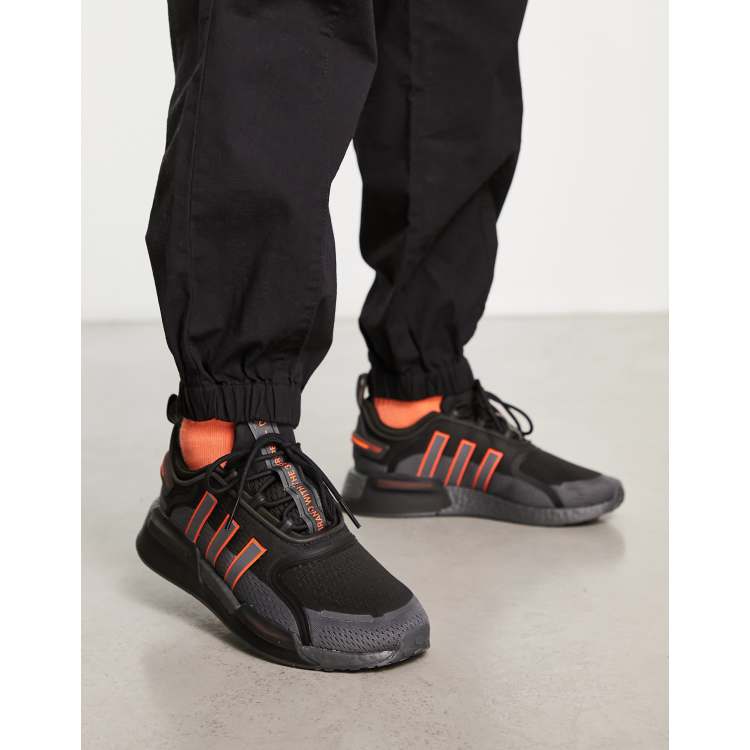 Adidas black and store orange shoes