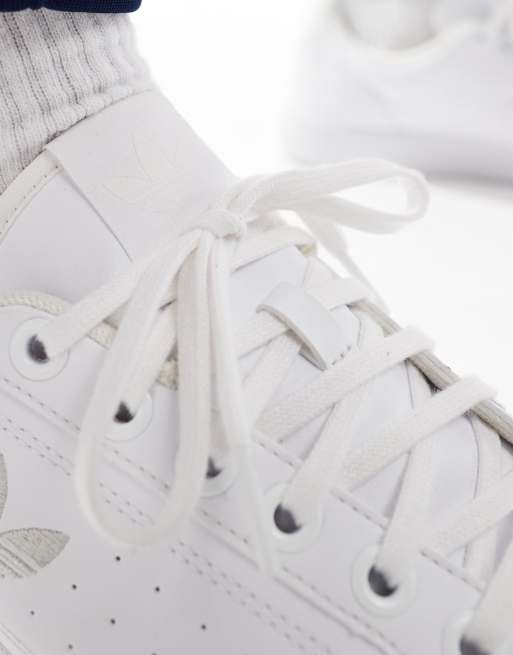 All white adidas leather online