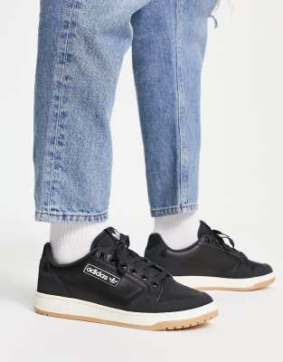 adidas Originals NY90 trainers in black with gum sole