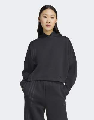 adidas Originals - Off Placed - Kapuzenpullover in Schwarz mit den drei Streifen