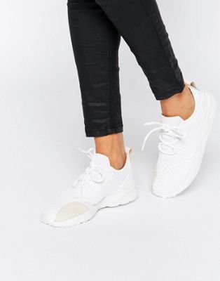 white netted adidas trainers