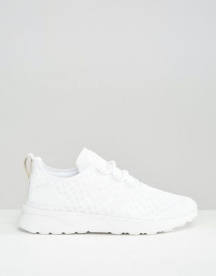 white netted adidas trainers