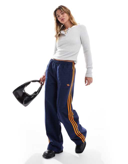 adidas Originals - Oversized trainingsbroek in jaren 70-stijl met monogram in blauw