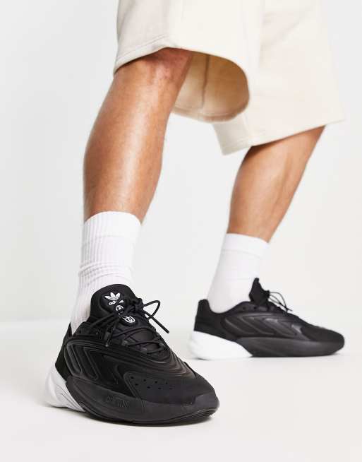 adidas Originals Ozelia sneakers in black with contrast heel | ASOS