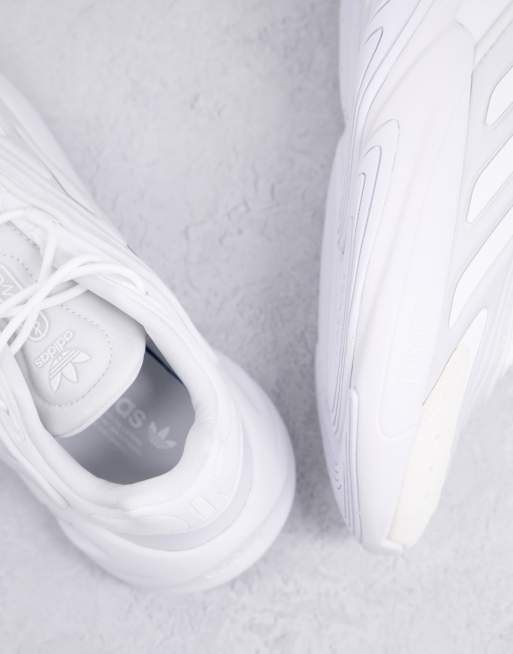 adidas Originals Ozelia sneakers in triple white | ASOS