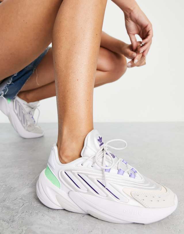 adidas Originals Ozelia sneakers in white with purple details